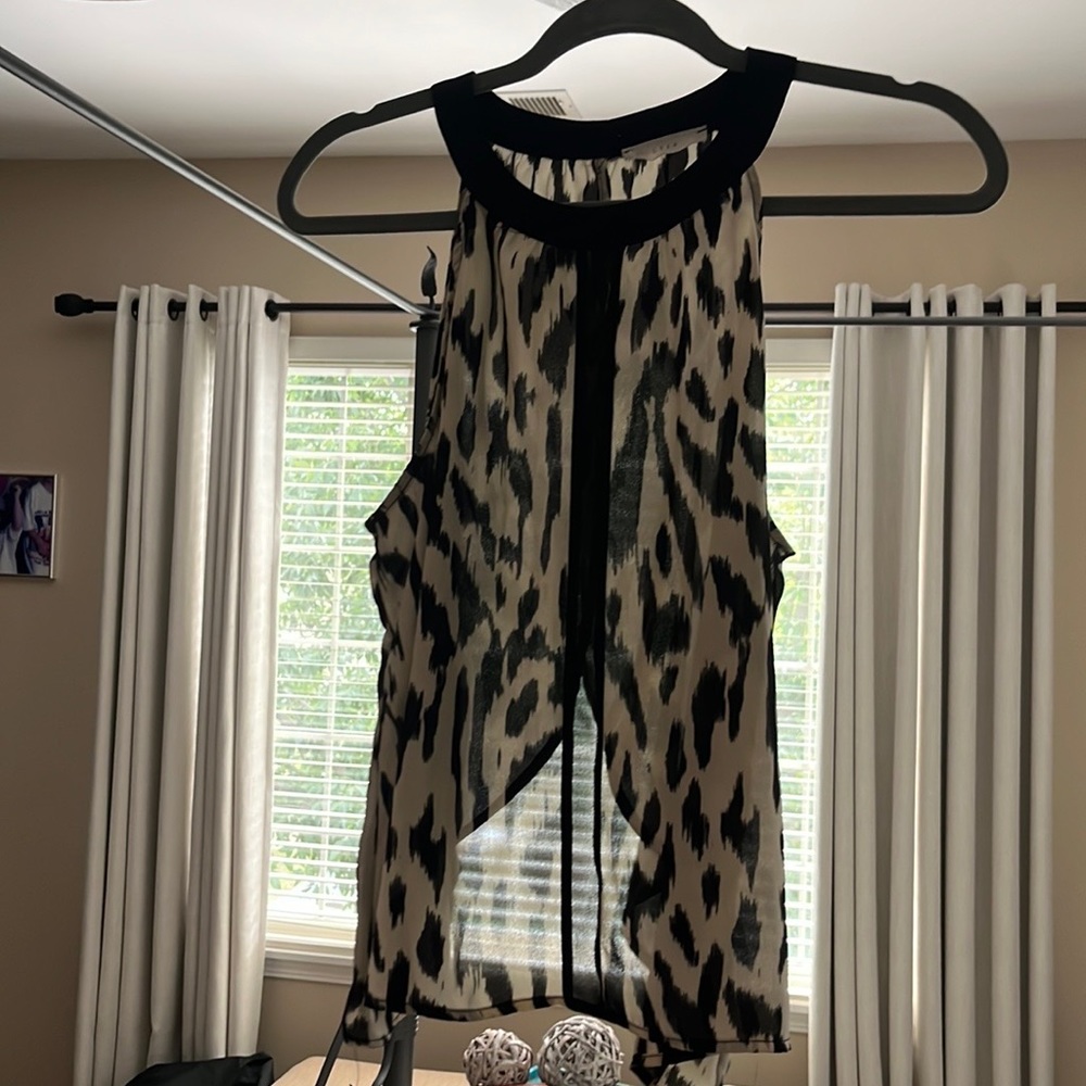 High neck open back blouse